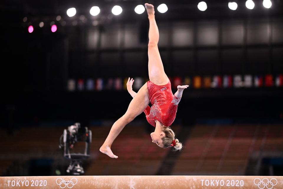 <p>USA's Jade Carey competes in the artistic gymnastics balance beam event of the women's qualification during the Tokyo 2020 Olympic Games at the Ariake Gymnastics Centre in Tokyo on July 25, 2021. (Photo by Loic VENANCE / AFP) (Photo by LOIC VENANCE/AFP via Getty Images)</p> 
