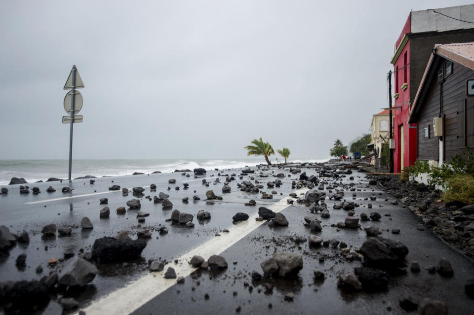 Strong waves driven by Hurricane Maria swept rocks onto a road in Le Carbet, Martinique, seen&nbsp;on Sept. 19, 2017.