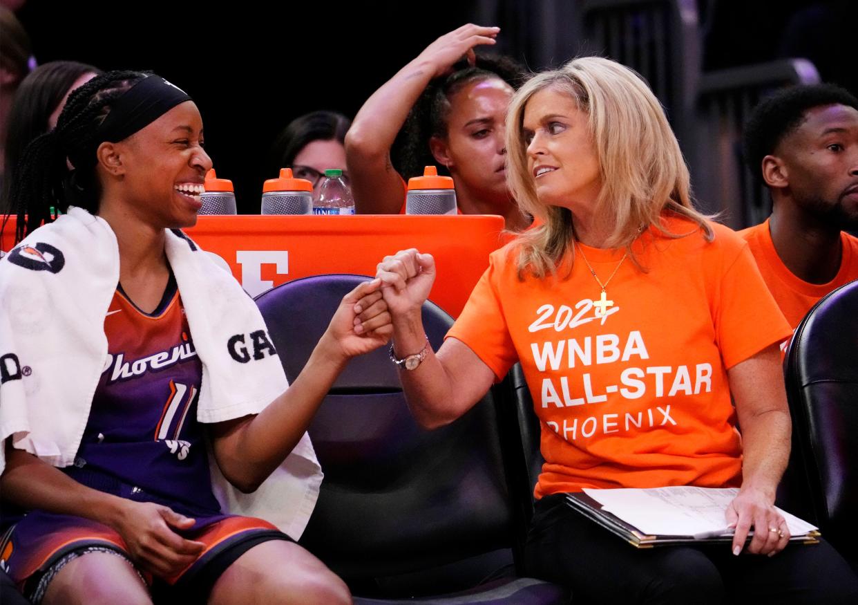 Phoenix Mercury guard Shey Peddy (11) talks to assistant coach Charli Turner Thorne during action against the Connecticut Sun in the second half at Footprint Center in Phoenix on July 18, 2023.