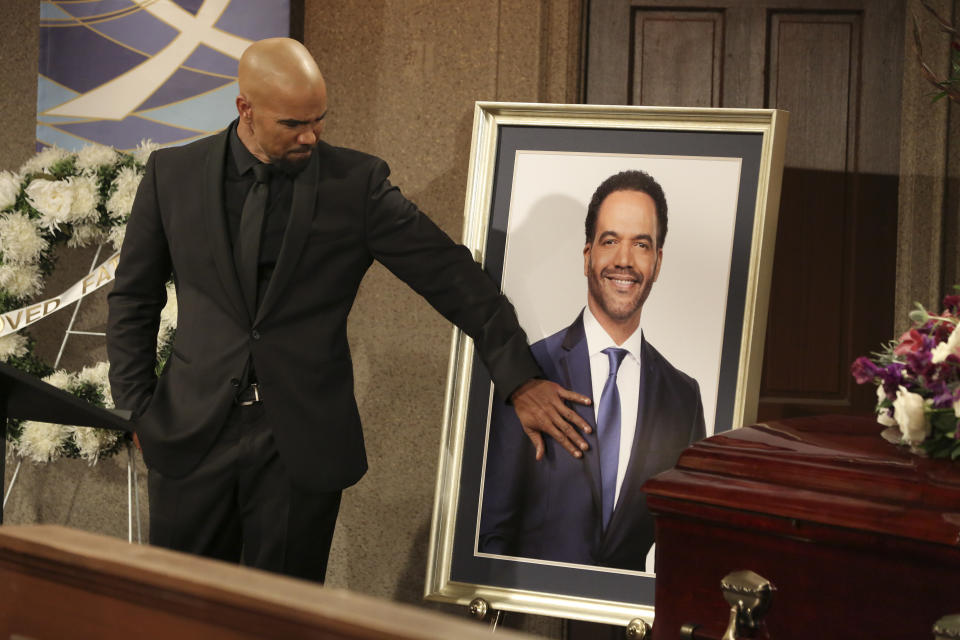 CORRECTS CHARACTER NAME FROM MORGAN TO WINTERS - This image released by CBS shows Shemar Moore portraying Malcolm Winters during a funeral scene for the character Neil Winters, portrayed by the late actor Kristoff St. John, in the daytime series "The Young and the Restless." St. John, who died at age 52 in February of heart disease, helped cement the prominence of major African-American characters in the traditionally white soap opera world. (Michael Yarish/CBS via AP)