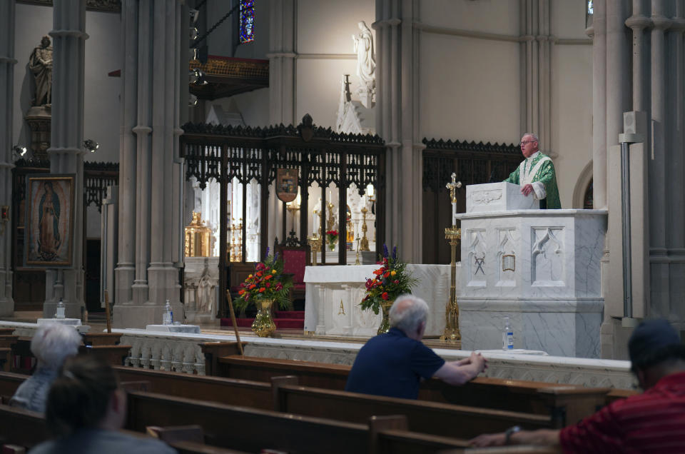 FILE - The Very Rev. Kris Stubna, rector of St. Paul Cathedral Parish, gives a homily on the topic of abortion and the recent Supreme Court decision to overturn Roe v. Wade during Mass at St. Paul Catholic Cathedral in Pittsburgh on Sunday, June 26, 2022. Stubna discarded his planned Sunday homily and focused on the decision, calling it “a day of great joy and blessing.” He said the overturning of the nearly 50-year-old Roe v. Wade ruling was the result of prayers and efforts of many Catholics and others. “This law violated the very law of God, that every life is sacred,” he said. “A person cannot support abortion and still be a faithful member of the church.” (AP Photo/Jessie Wardarski, File)