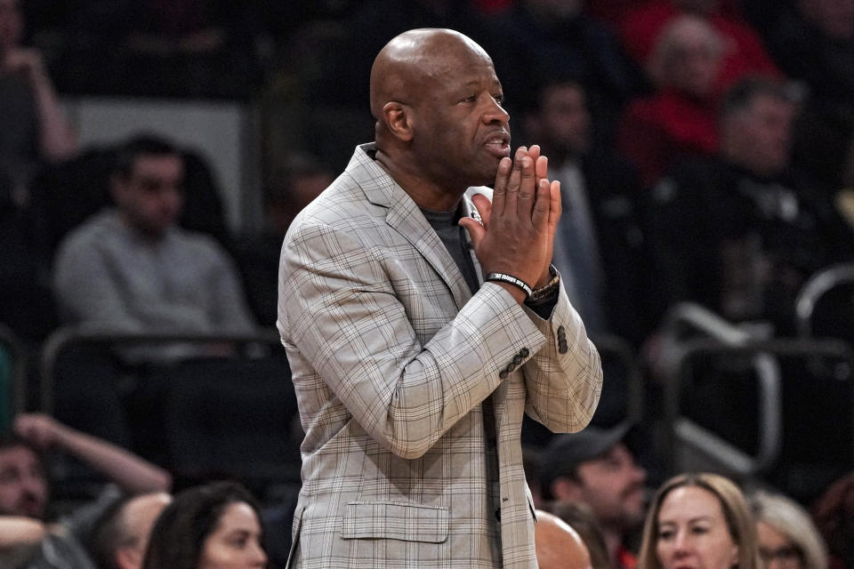 St. John's coach Mike Anderson watch his team play against UConn during an NCAA college basketball game, Saturday, Feb. 25, 2023, in New York. (AP Photo/Bebeto Matthews)