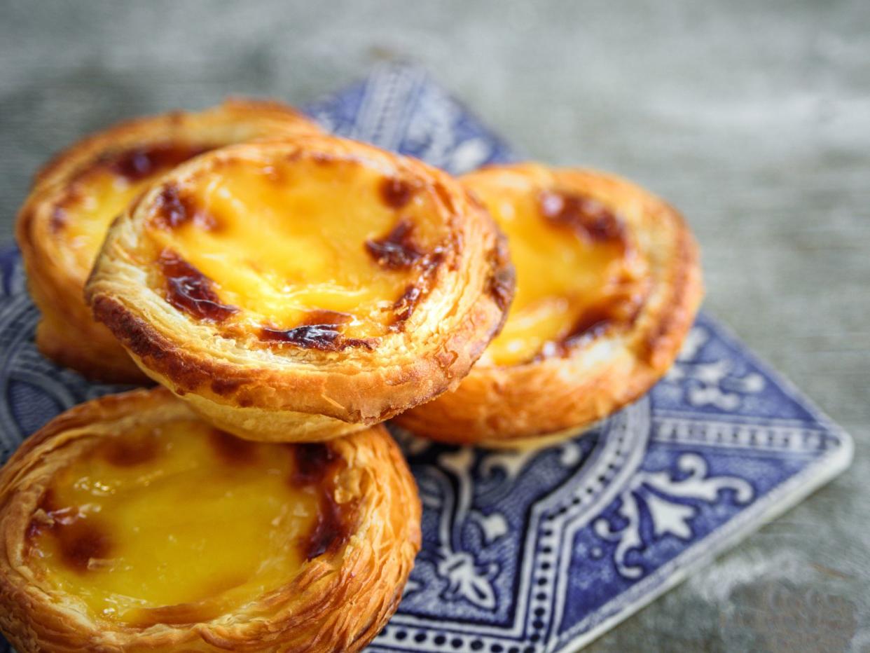 Portugal egg tart Pastel de Nata with azulejo tile