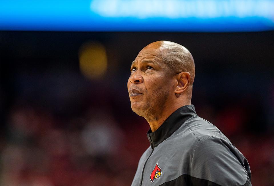 Louisville head coach Kenny Payne gave a worried glance at the scoreboard as the Cards fall to Lipscomb 75-67 at the Yum! Center in downtown Louisville Tuesday night. Dec. 20, 2022