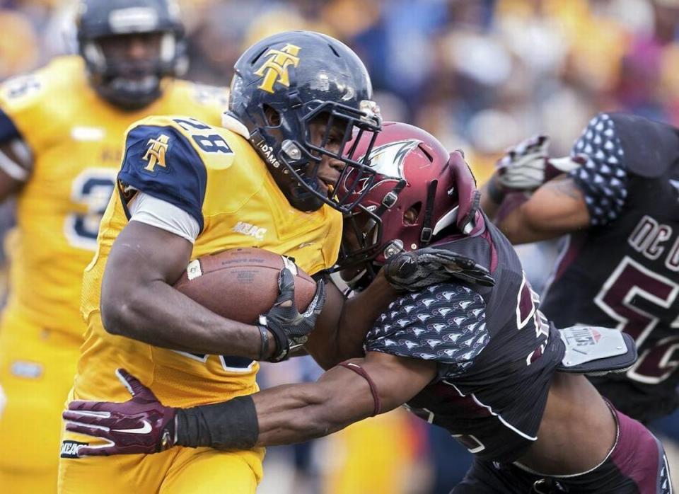 NCCU’s Alden McClellon tackles North Carolina A&T’s Tarik Cohen — a rookie sensation for the Chicago Bears during his just-completed NFL rookie year — during the second quarter of NCCU’s Nov. 19, 2016 42-21 win over N.C. A&T at NCCU’s O’Kelly-Riddick Stadium.