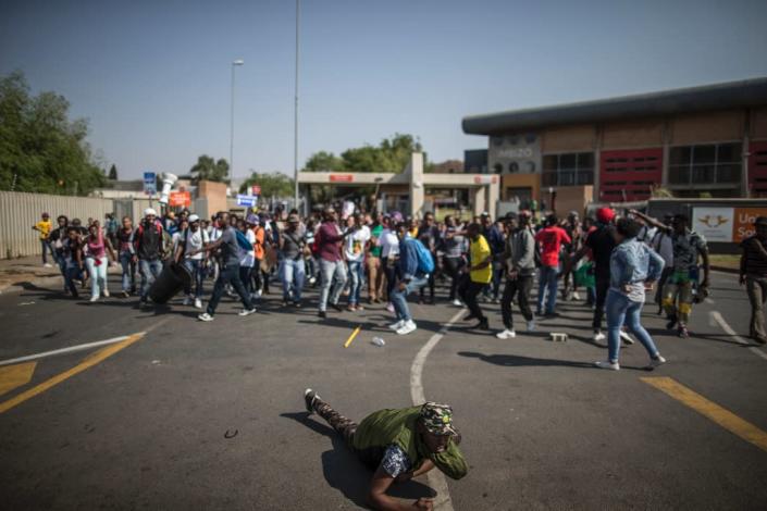 South African college students protests, calling for free further education, have resulted in temporary closing of campuses including the University of Cape Town, Wits University in Johannesburg and the Durban University of Technology (AFP Photo/Marco Longari)