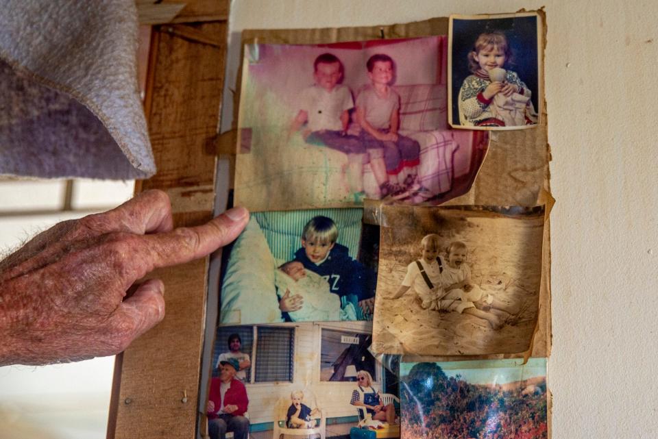 Paul da la Pena, 65, owner of the Nevada Motel on Long Beach Avenue, points to family photos in the motel office on July 28, 2021 in York, Maine. The motel, which was put up for sale three weeks earlier, is thought to be among the first motels in the state of Maine and has been in the same family for 70 years.