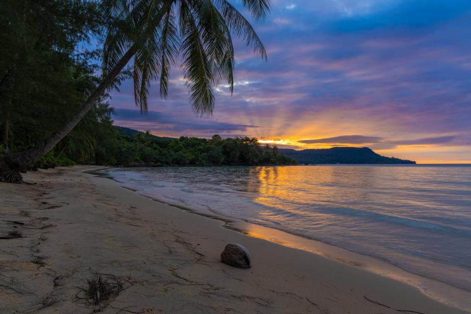 You’ll find Lonely Beach in the far north of Koh Rong, backed by lush forest (Getty Images)