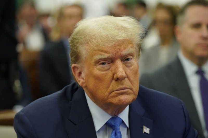 Former President Donald Trump waits in the courtroom on the day that he will testify in his civil fraud trial at State Supreme Court on Nov. 6, in New York City. Pool Photo by Eduardo Munoz/UPI