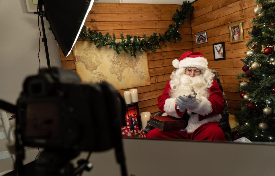 <p>Santa’s grotto via Zoom</p>AFP via Getty Images