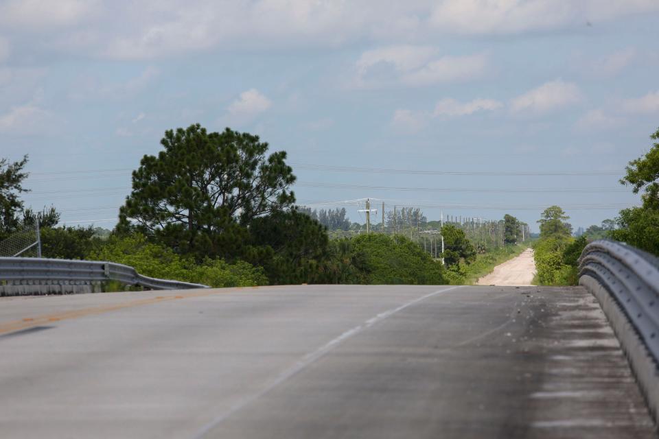 Oslo Road is seen from the Interstate 95 overpass heading west toward a dirt road Monday, Aug. 7, 2023, when  the Indian River County Chamber of Commerce hosted a ribbon-cutting ceremony for a new interchange. The big question is what kind of development will occur when the work is completed.