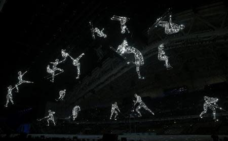 Lit figures are seen during the opening ceremony of the 2014 Sochi Winter Olympics, February 7, 2014. REUTERS/Jim Young