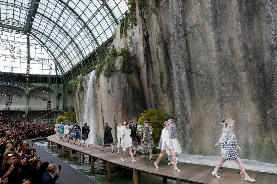 <p>For the SS18 show, the French fashion house further cemented its status as one of the most spectacular runways in the world with models stepping out beneath cascading waterfalls.<em> [Photo: Getty]</em> </p>