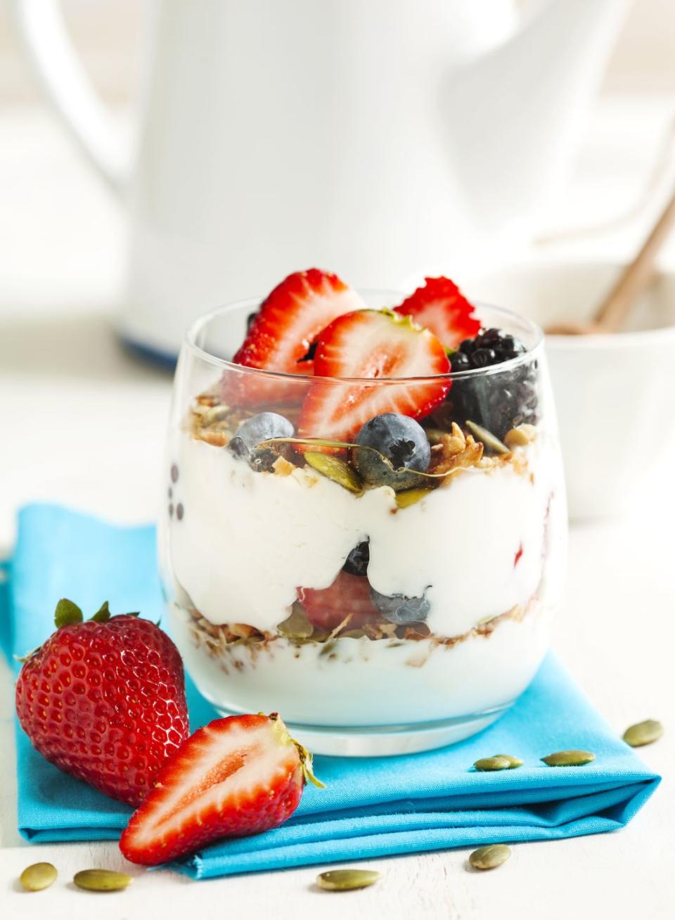 <p><strong>Opt for plain yogurt and flavor it yourself using nature's candy (aka fruit). </strong>Load it up with berries for tons of fiber and antioxidants. Bonus points for picking Greek yogurt which has a ton of filling protein.</p>