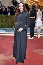 <p>Sophie Turner showed off her baby bump in a Louis Vuitton gown. </p>