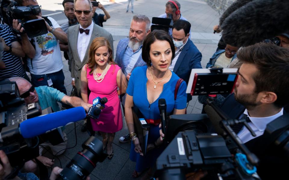Sarah Ransome, an alleged victim of Jeffrey Epstein and Ghislaine Maxwell, right, alongside Elizabeth Stein, left, speak to members of the media outside court