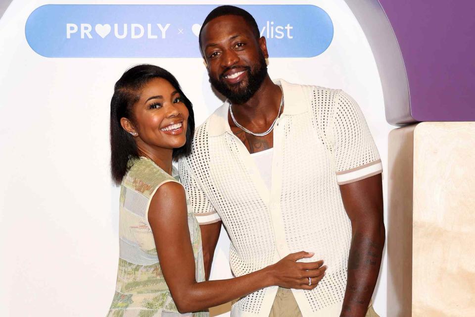 <p>Jerritt Clark/Getty</p> Gabrielle Union and Dwyane Wade at the PROUDLY Hair Care Launch