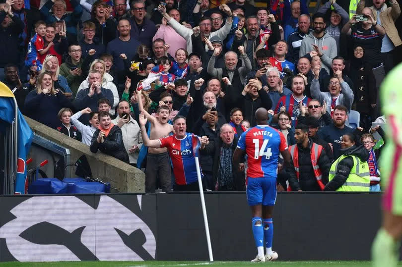 Jean-Philippe Mateta of Crystal Palace celebrates the opening goal with the Crystal Palace fans during the Premier League match between Crystal Palace and Manchester City at Selhurst Park on April 6, 2024