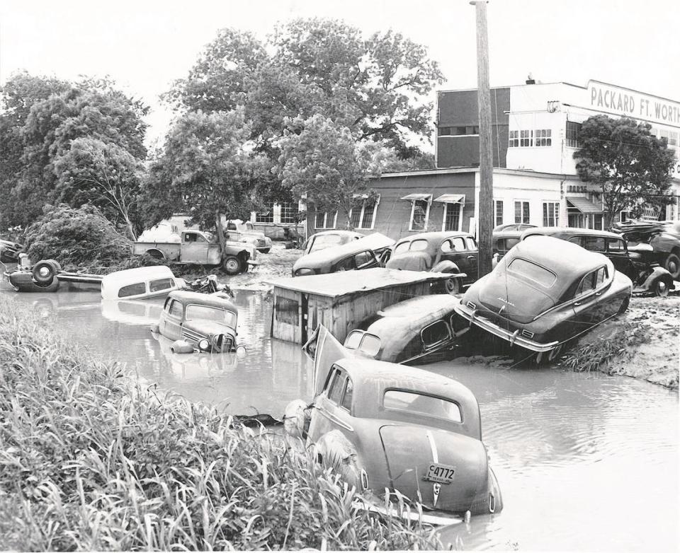 About 150 cars were swept from the Packard Motor Co. at 2400 W. Seventh St. during the May 1949 flood of the Trinity River. At least 10 people were killed and 13,000 left homeless during one of the worst floods in the city’s history.