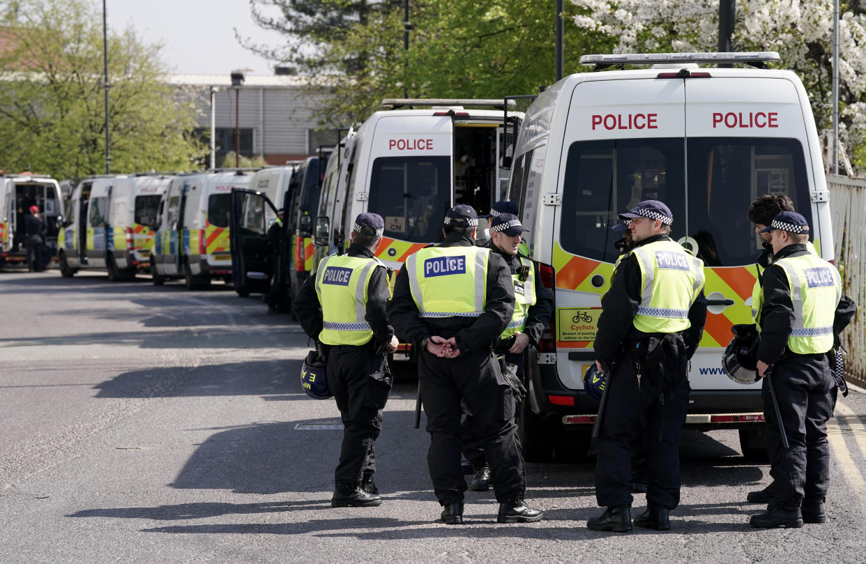 Police units are seen outside the ground as fans begin to arrive before the Emirates FA Cup semi final match at Wembley Stadium, London. Picture date: Saturday April 16, 2022.