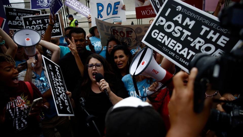 Anti-abortion demonstrators outside the US Supreme Court in Washington, D.C., US, on Friday, June 24, 2022. A deeply divided Supreme Court overturned the 1973 Roe v. Wade decision and wiped out the constitutional right to abortion, issuing a historic ruling likely to render the procedure largely illegal in half the country. Photographer: Samuel Corum/Bloomberg via Getty Images