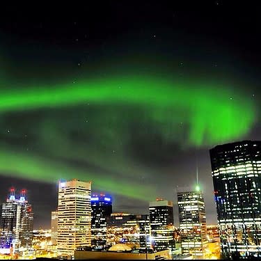 The Aurora Borealis ( or Northern lights ) are spotted over Downtown Edmonton Mon nite. No filter #yeg #yegm. Edmonton, Alberta.