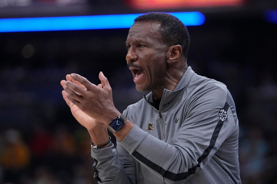 Detroit Pistons coach Dwane Casey applauds during the first half against the Indiana Pacers at Gainbridge Fieldhouse in Indianapolis on Friday, April 7, 2023.