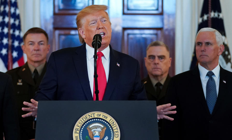 U.S. President Donald Trump delivers a statement about Iran flanked by U.S. Army Chief of Staff General James McConville, Chiarman of the Joint Chiefs of Staff Army General Mark Milley and Vice President Mike Pence in the Grand Foyer at the White House in Washington, U.S., January 8, 2020. REUTERS/Kevin Lamarque