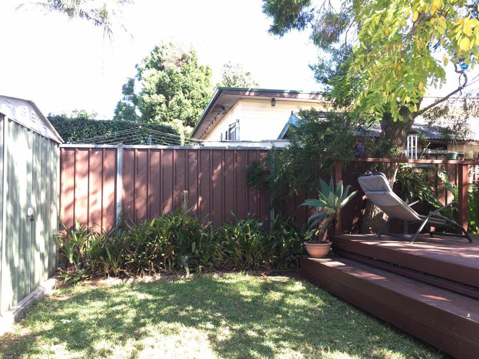Photo of Lee and Linda Solomons' fence before DIY table fold-down job
