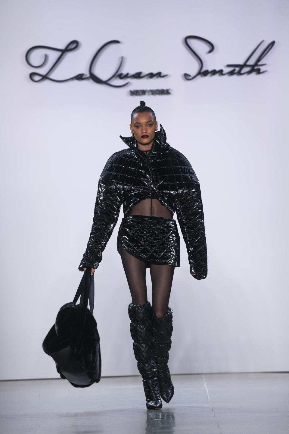 The LaQuan Smith collection is modeled during Fashion Week, Saturday, Feb. 8, 2020, in New York. (AP Photo/Eduardo Munoz Alvarez)