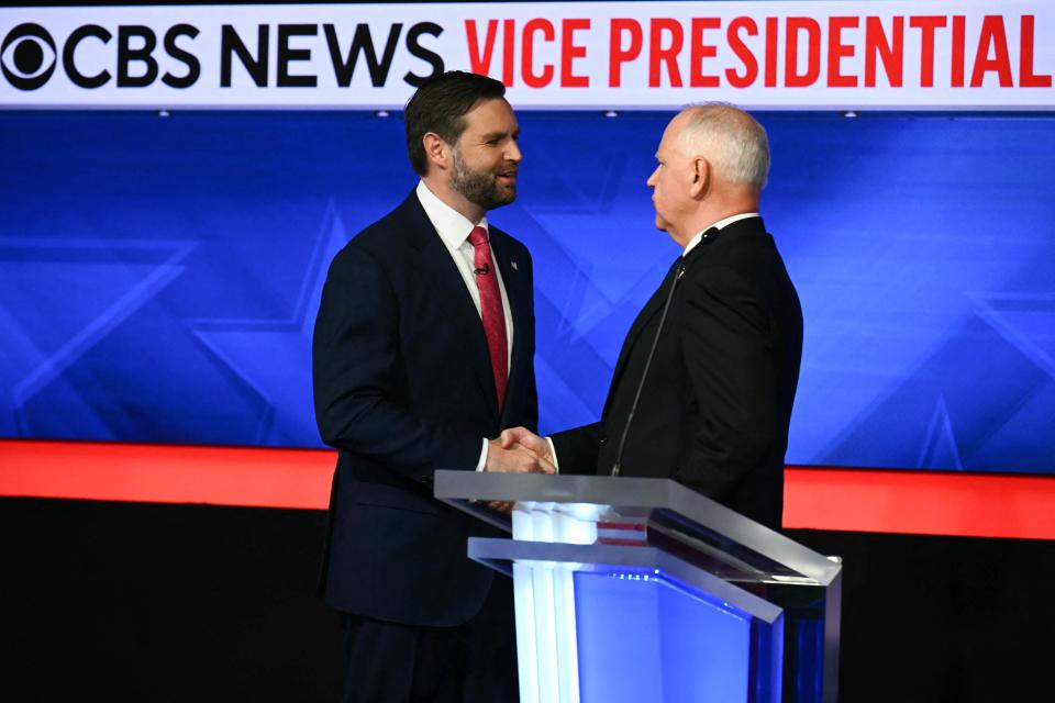 JD Vance and Tim Walz gave each other a cordial handshake to end the evening (AFP via Getty Images)