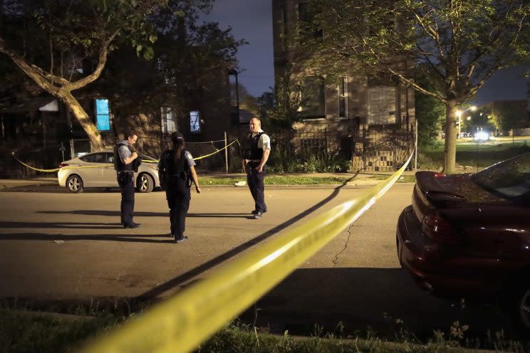 Police investigate the scene of a shooting on May 27, 2017, in Chicago.