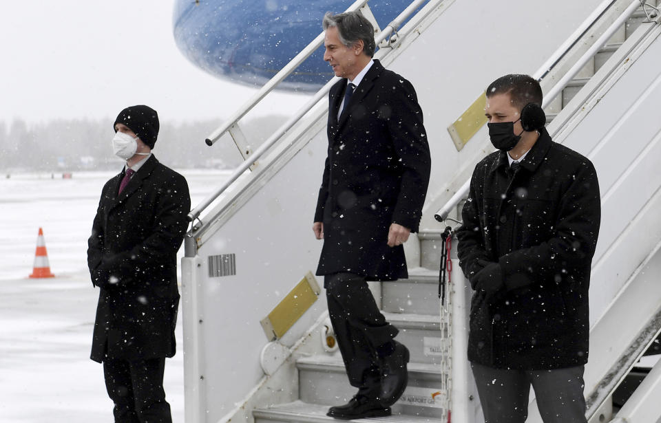 U.S. Secretary of State Antony Blinken, center, disembarks from his plane upon arriving in Tallinn, Estonia, on Tuesday, March 8, 2022. Blinken visited Lithuania and Latvia on Monday to calm any fears that they and Estonia, which he is visiting Tuesday, have about their security. The three Baltic countries, which endured decades of Soviet occupation before regaining their independence in 1991, are members of the EU and NATO. (Olivier Douliery/Pool Photo via AP)