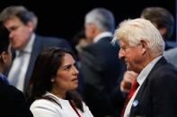 Conservative MP Priti Patel (L) talks with Stanley Johnson (R), father of Conservative MP Boris Johnson, at an event to announce the winner of the Conservative Party leadership contest in central London on July 23, 2019. (Photo by Tolga AKMEN / AFP) (Photo credit should read TOLGA AKMEN/AFP via Getty Images)