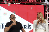 Illusionist David Blaine, left, performs live onstage as Paris Hilton watches during the YouTube TCA 2020 Winter Press Tour at the Langham Huntington, Saturday, Jan. 18, 2020, in Pasadena, Calif. (Photo by Willy Sanjuan/Invision/AP)