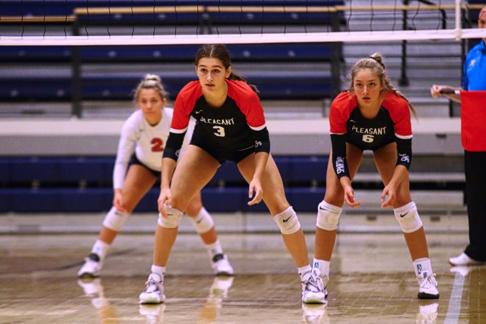 The Pleasant Spartans are set to receiver a serve during last year's Division III district championship volleyball match at Mount Vernon Nazarene University last fall.