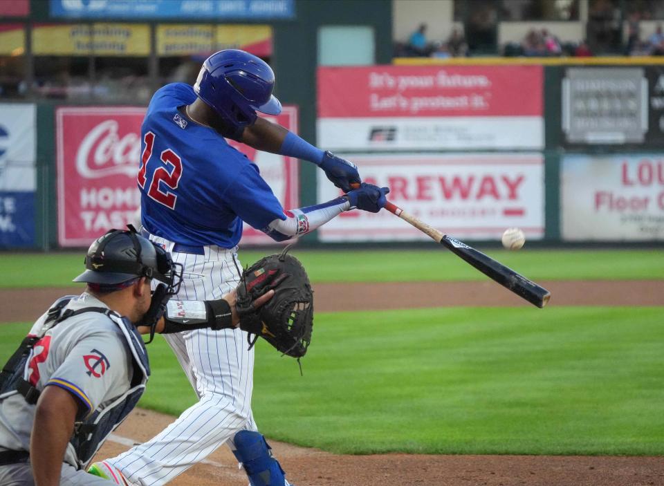Iowa Cubs right fielder Alexander Canario connects for a base hit against St. Paul during a Triple-A baseball game on Aug. 23, 2022, at Principal Park in Des Moines. Cubs home games will feature the automated balls and strikes system part of the time this summer.