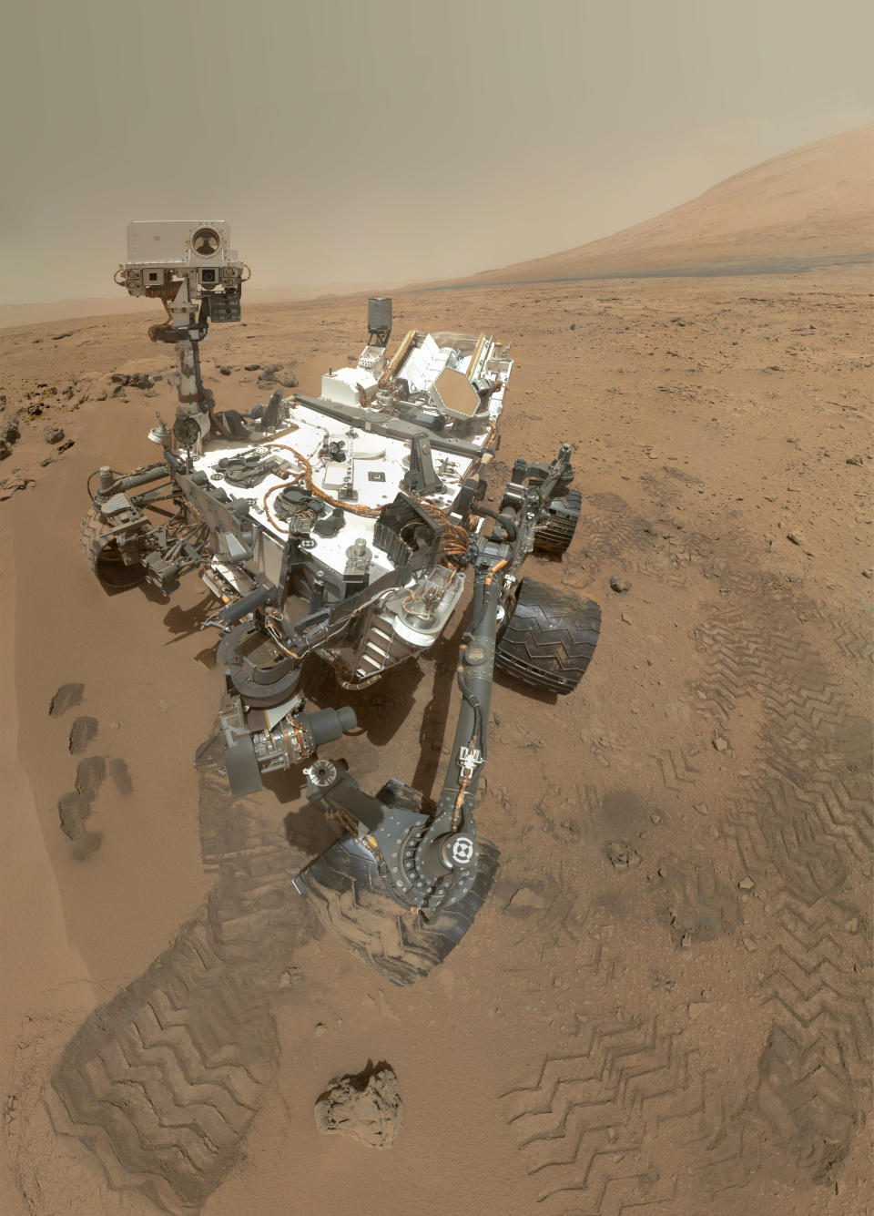 On Sol 84 (Oct. 31, 2012), NASA's Curiosity rover used the Mars Hand Lens Imager (MAHLI) to capture this set of 55 high-resolution images, which were stitched together to create this full-color self-portrait. (NASA)