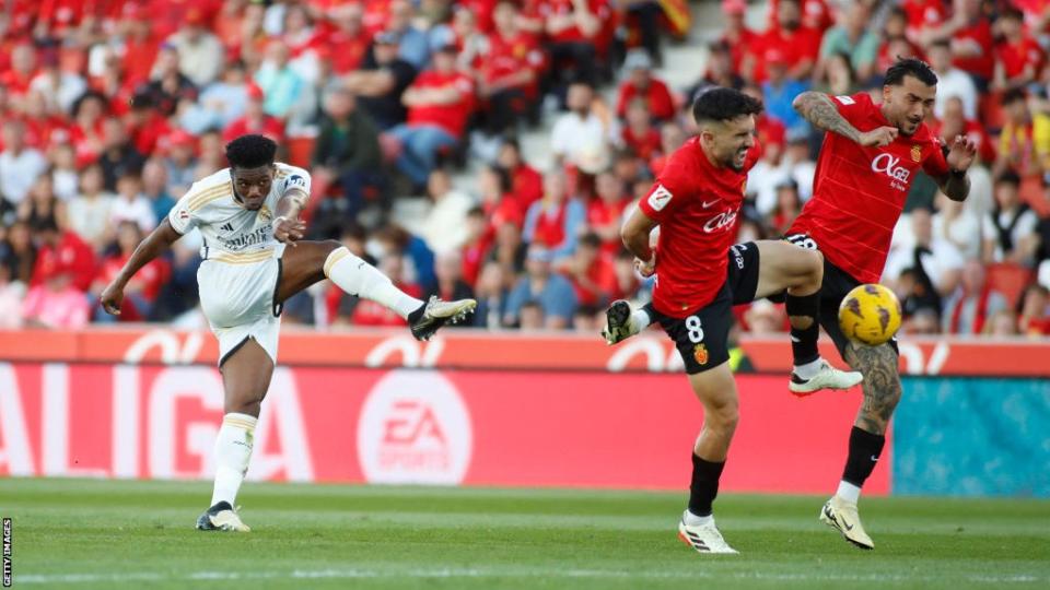 Real Madrid midfielder Aurelien Tchouameni shoots from distance