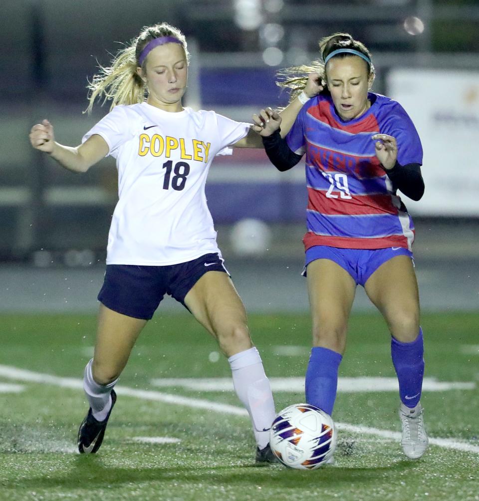 Copley's Emma Niemczura strips the ball from Revere's Sierra White on Tuesday, Sept. 26, 2022 in Bath Township.