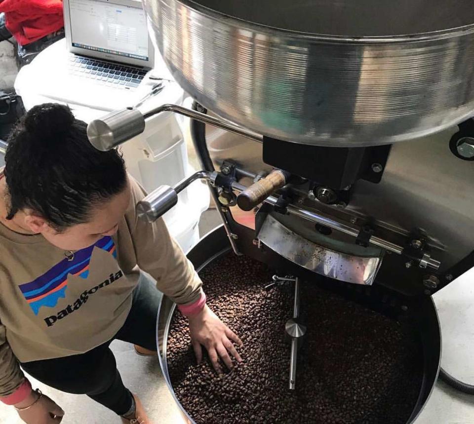selina checking coffee beans