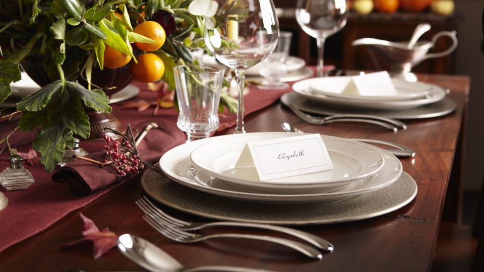 table settings with place cards and autumn foliage