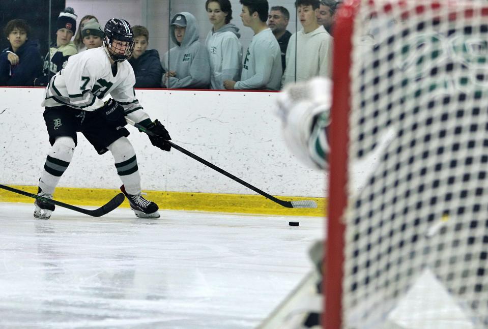 Duxbury's Aiden Harrington drives to the net during a state tournament game against Dartmouth on Wednesday, March 9, 2022.
