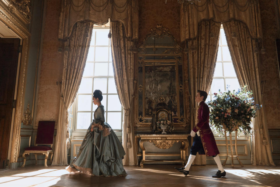 Queen Charlotte: A Bridgerton Story. (L to R) India Amarteifio as Young Queen Charlotte, Sam Clemmett as Young Brimsley in episode 102 of Queen Charlotte: A Bridgerton Story. Cr. Liam Daniel/Netflix © 2023