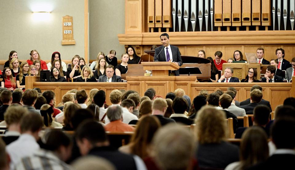 Eboo Patel, founder and president of Interfaith America, speaks from the pulpit at the Institute of Religion near the University of Utah.