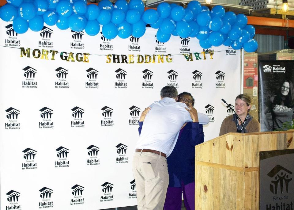 Rose Mary Hayes celebrated in Pensacola Habitat for Humanity's mortgage shredding party on April 27.