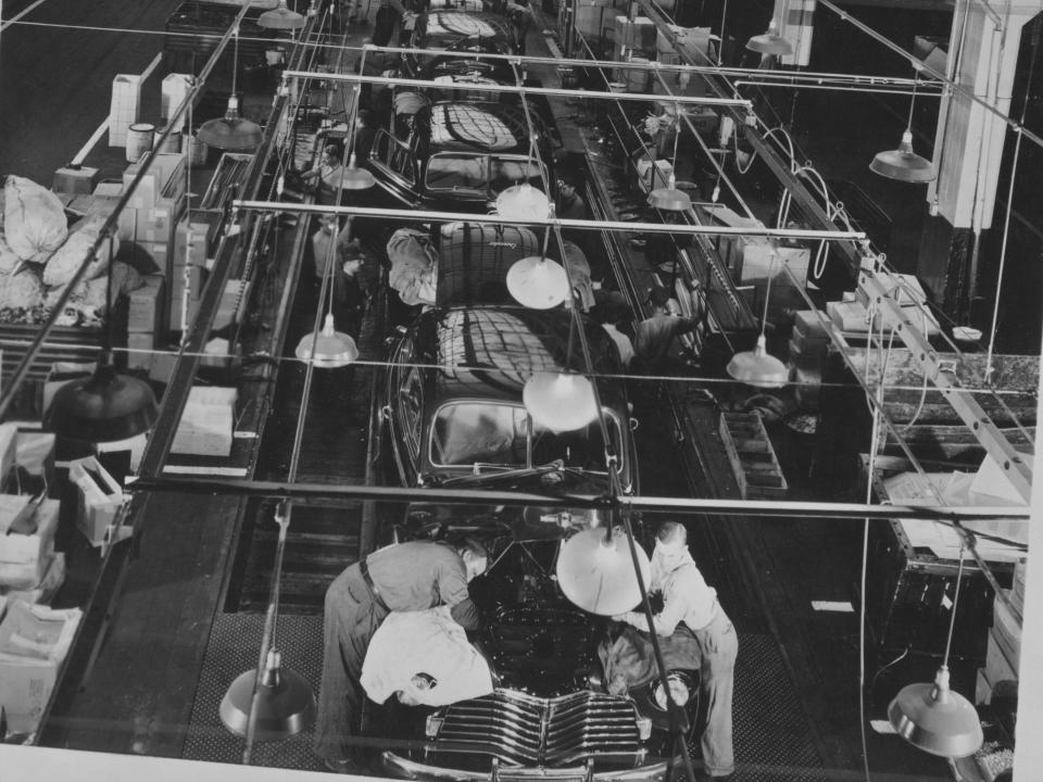 Overhead view of a motor car production line at a factory, USA, circa 1930.