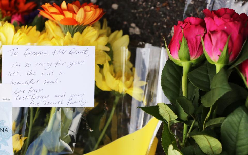 Flowers have been left at the scene by family and friends - BEN LACK FOR THE TELEGRAPH