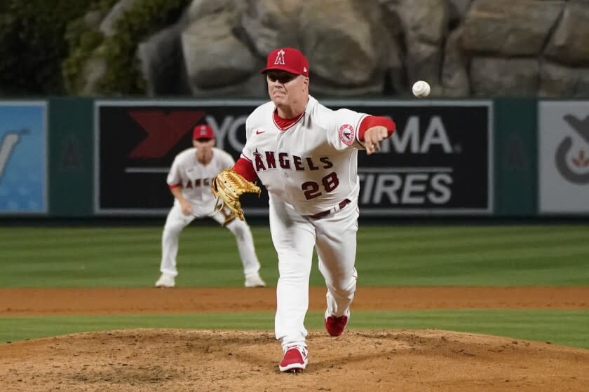 Los Angeles Angels relief pitcher Aaron Loup (28) throws during a baseball game.