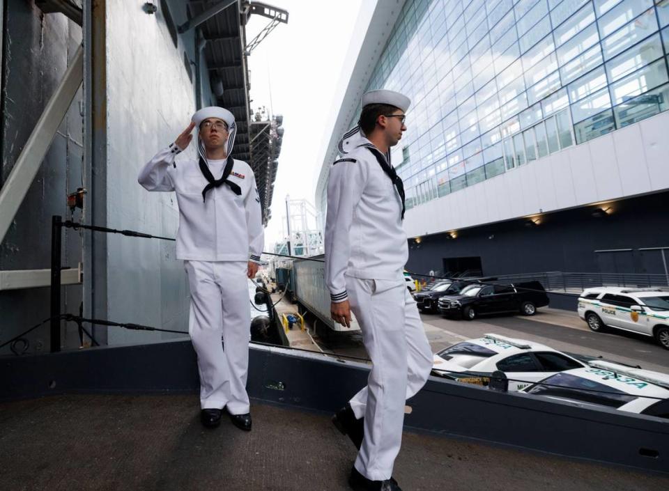 Sailors salute as they board the USS Bataan during the opening day of Fleet Week on Monday, May 6, 2024, at Norwegian Cruise Lines Terminal in PortMiami. Alie Skowronski/askowronski@miamiherald.com